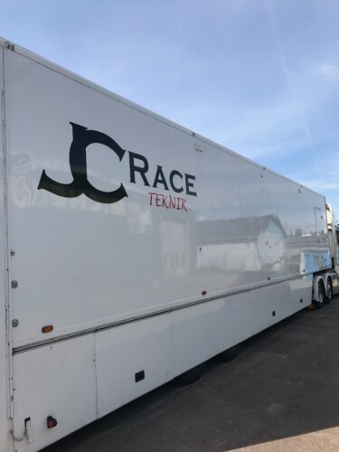 Racetrailer for 3 cars with awning.
